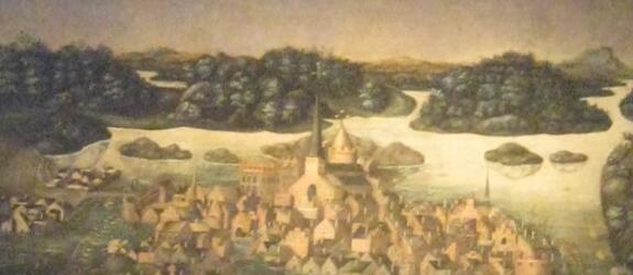 En bild av en tavla som föreställer Stockholm på 1500-talet samt en halo ovanför staden