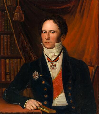 Muotokuvamaalaus Carl Johan Walleenista. Walleen on pukeutunut tummaan takkiin jonka rintaa koristaa kunniamerkki. Valkean, pystykauluksisen paidan päällä roikkuu kunniaristi sekä oranssi nauha.