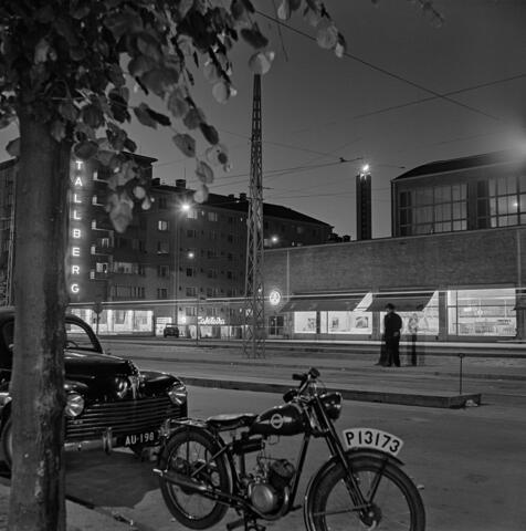 A nighttime view in Töölö district. The Olympic flame can be seen in the stadium tower.