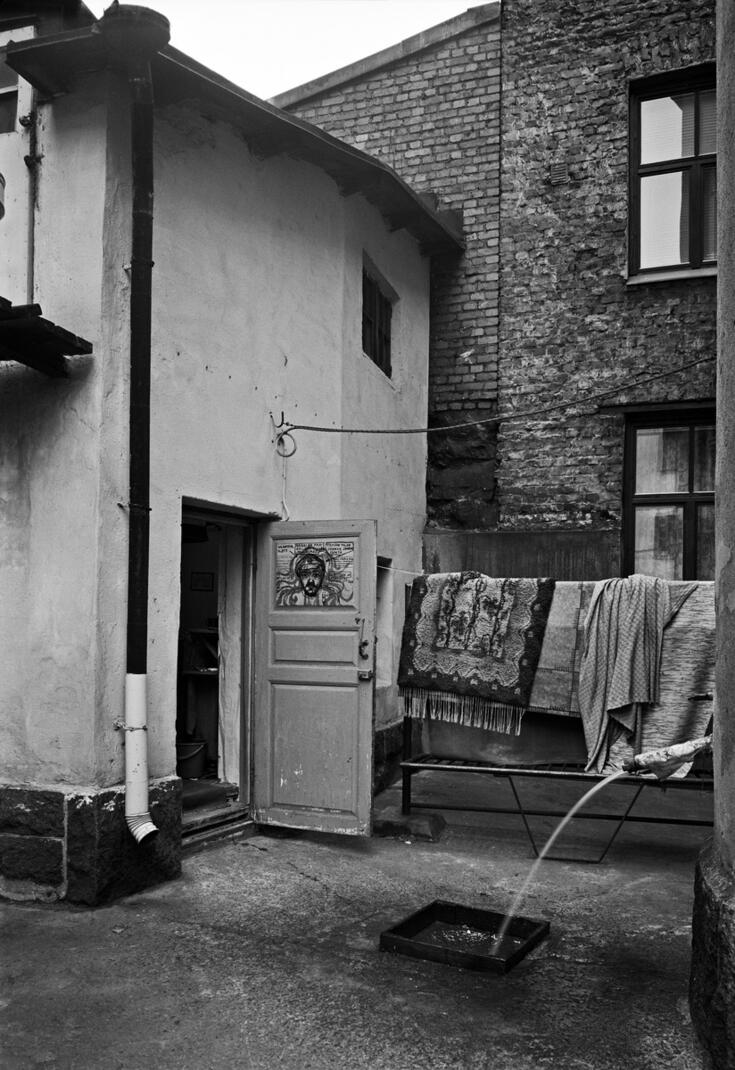 A faucet in front of the home of a pensioner living in an unheated outbuilding in the courtyard of Kristianinkatu 12.