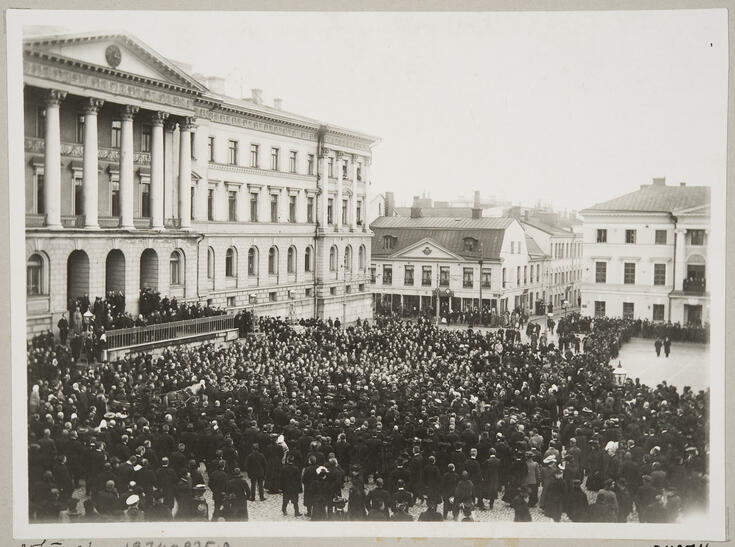 People gathered on the square, happy