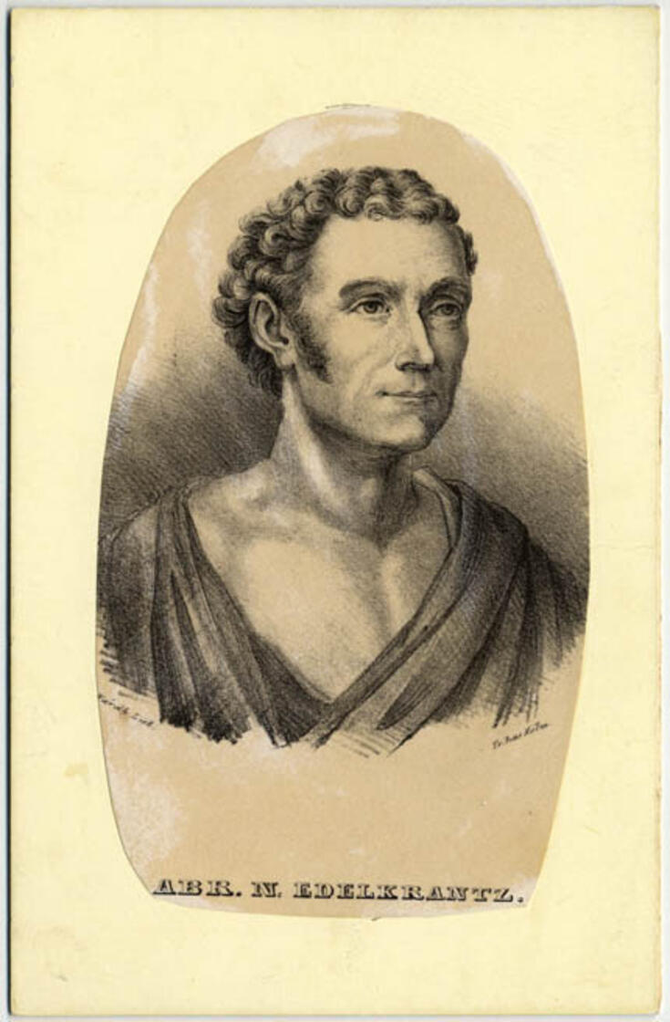 Tecknad bystbild av en man med krulligt hår och polisonger.