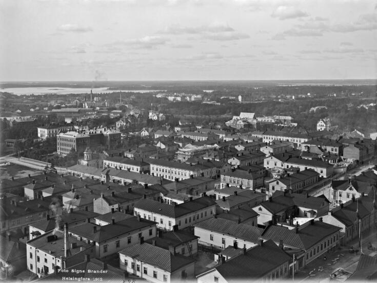 Tättbebyggda trähuskvarter där de flesta hus har en eller två våningar.