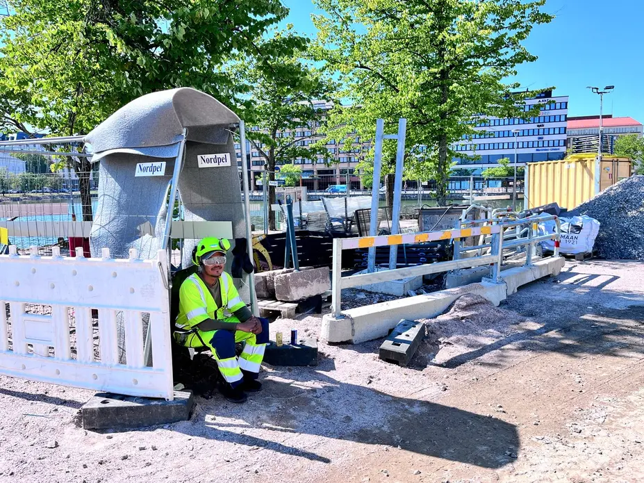 A worker in a building site at Hakaniemenranta