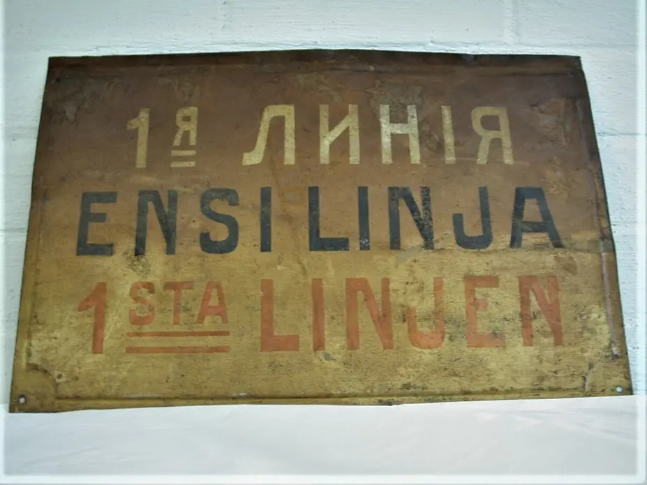 Första linjens gatuskylt