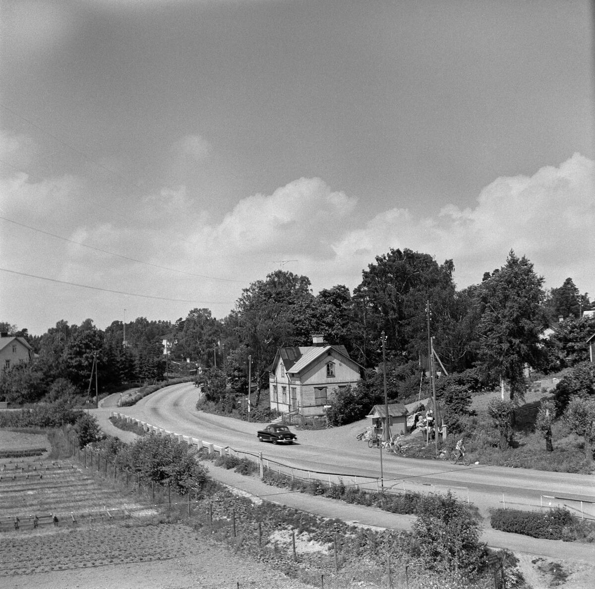 Södra Haga, Vichtisvägen 1 – Hemmansvägen 2. På vägen kör en Chevrolet av årsmodell 1952.