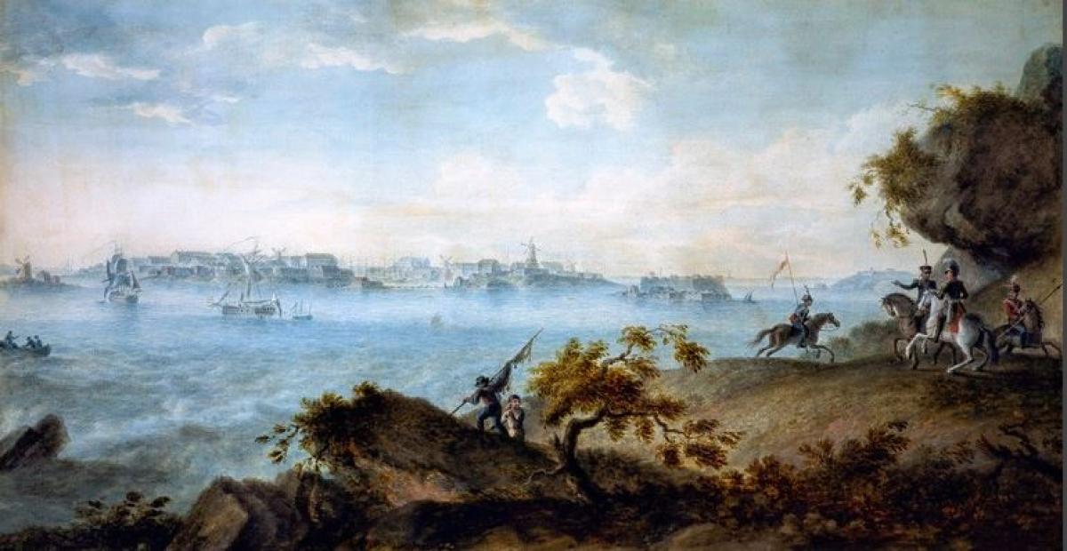 Sveaborg sett från Brunnsparken på en målning från år 1809. På stranden syns män till häst och framför Sveaborg syns segelfartyg.
