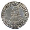 Hopeinen riikintaaleri vuodelta 1647. Kolikon etupuolella on kuningatar Kristiinan muotokuva ja lyhennelmä kirjoituksesta CHRISTINA DEI GRATIA SVECORUM GOTHORUM VANDALORUMQUE DESIGNATA REGINA ET PRINCEPS HAEREDITARIA.
